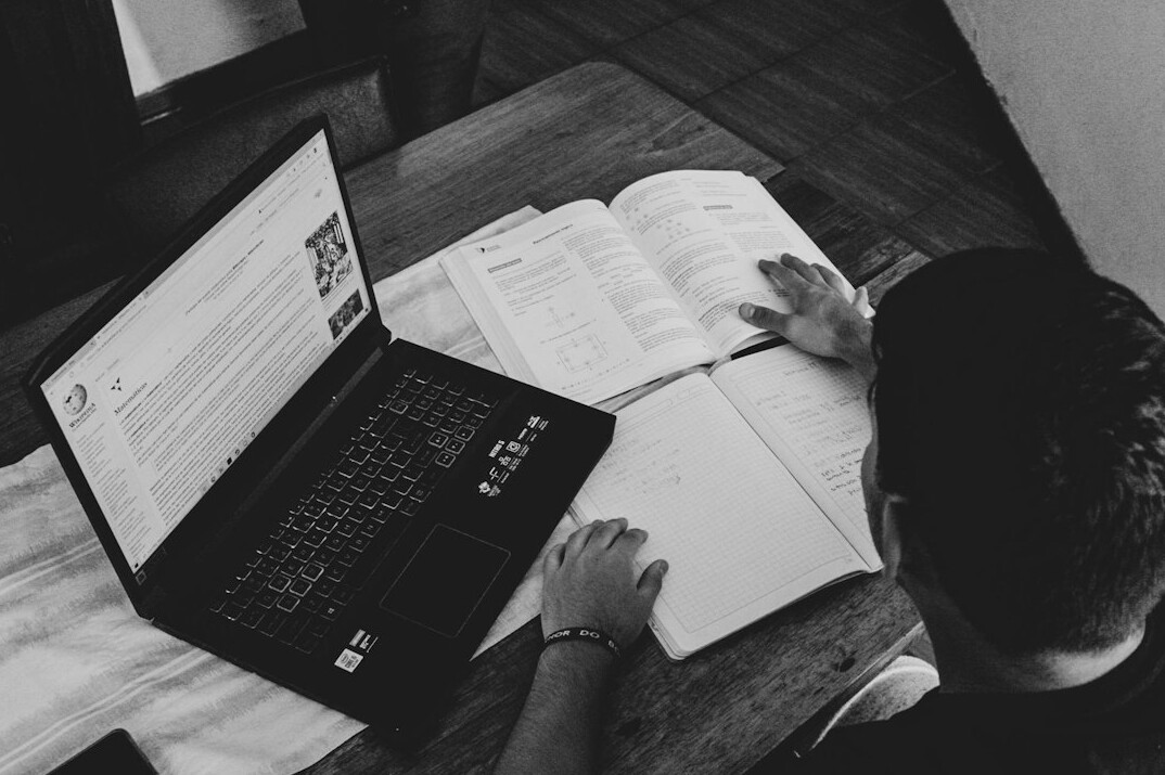 person studying finance books